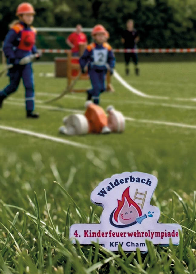 Individuelle Pins als Auszeichnung bei einer Kinderolympiade